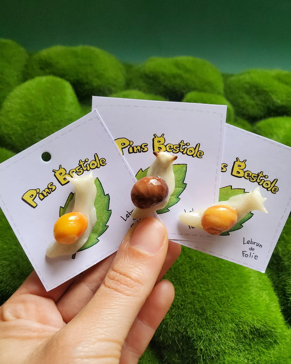Pins escargots phosphorescents