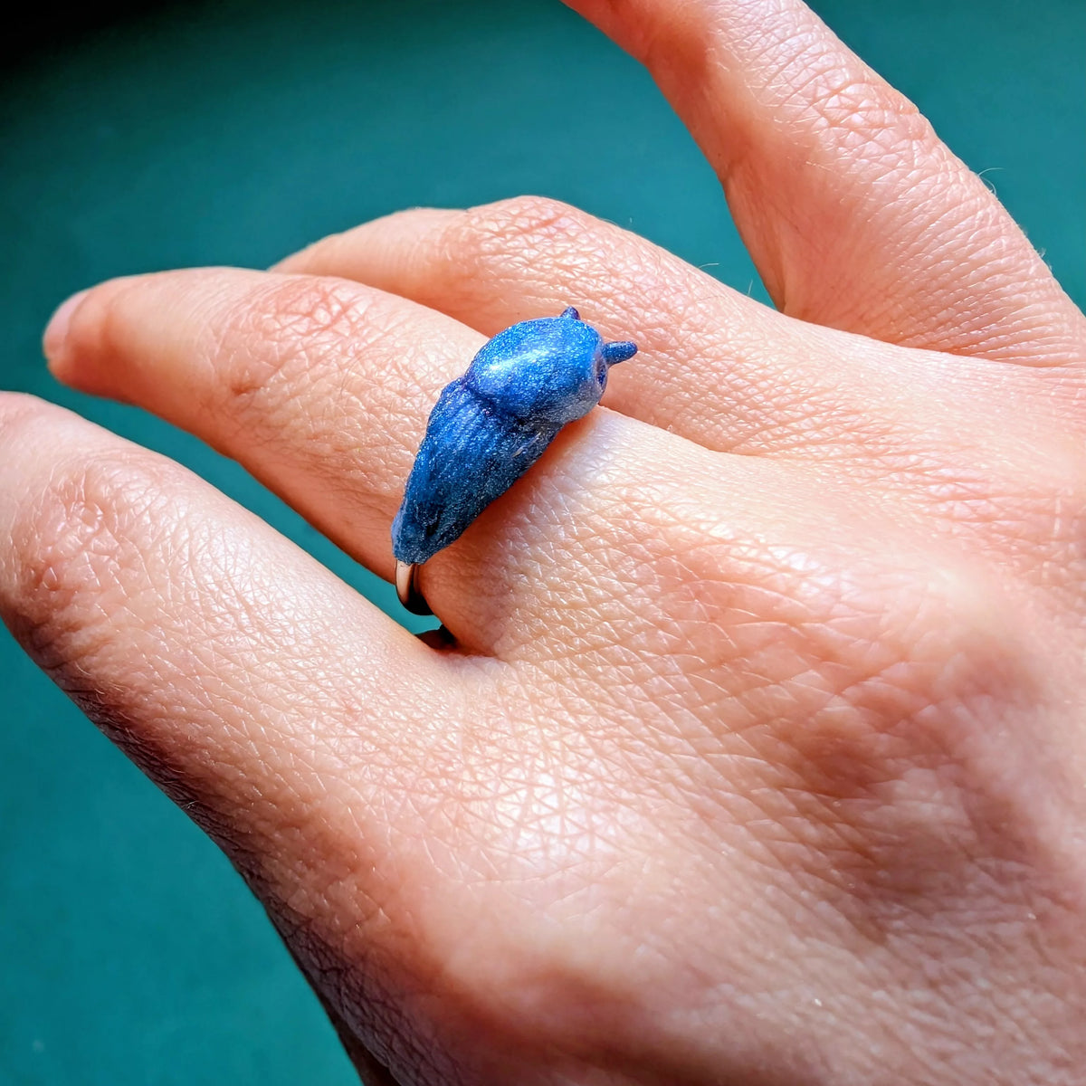 Bague réglable support acier inoxydable limace orange bleue banane